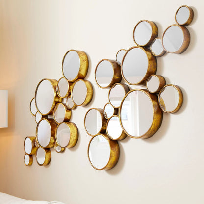 Bubbles Mirror by Cyan Design in gold. Made from iron, mirrored glass in a modern style.