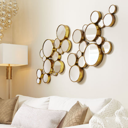Bubbles Mirror by Cyan Design in gold. Made from iron, mirrored glass in a modern style.
