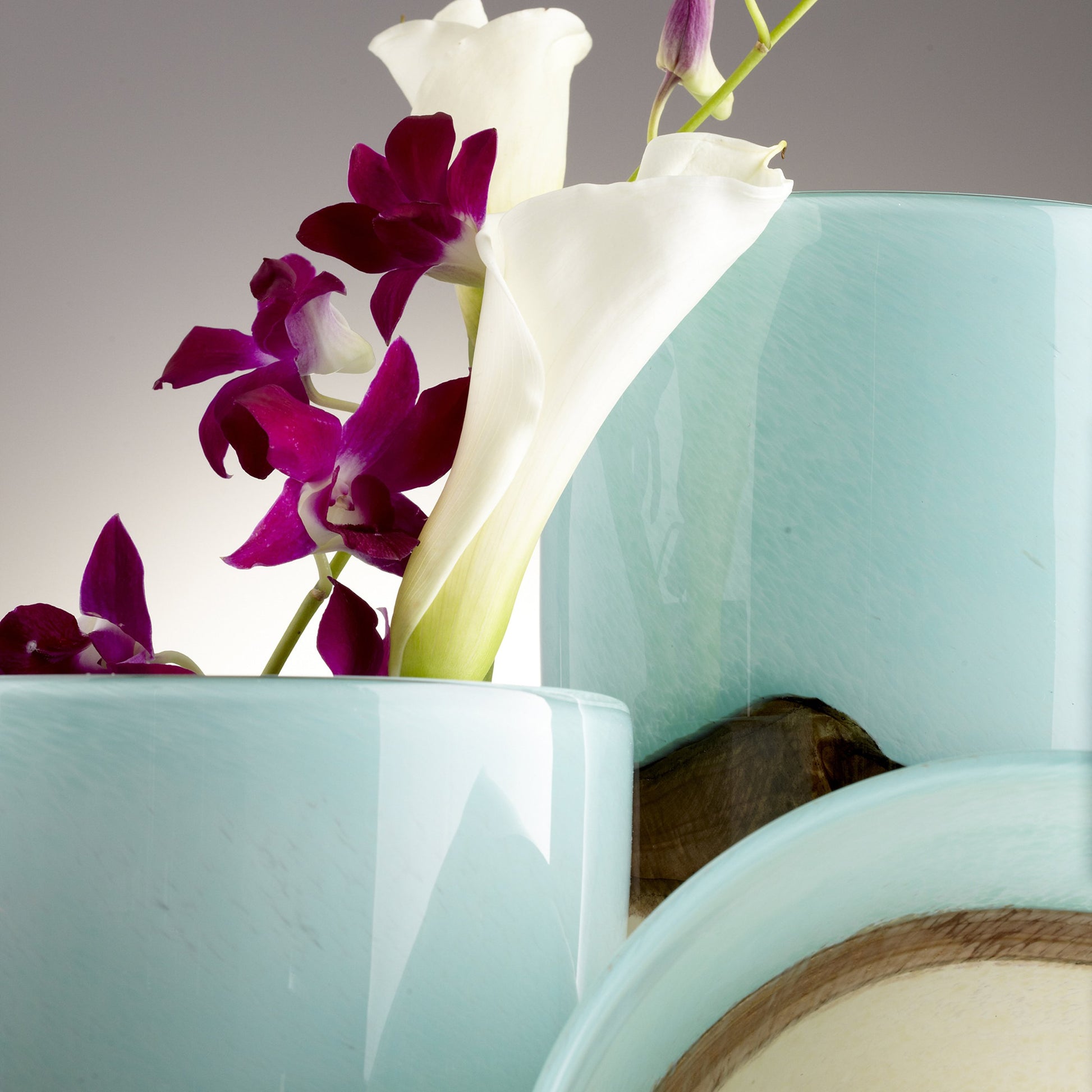 Turquoise Earth Vase by Cyan Design in blue. Made from glass in a modern style.