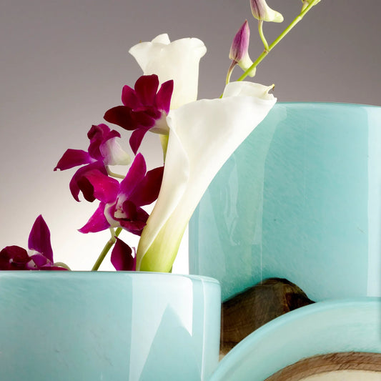 Turquoise Earth Vase by Cyan Design in blue. Made from glass in a modern style.