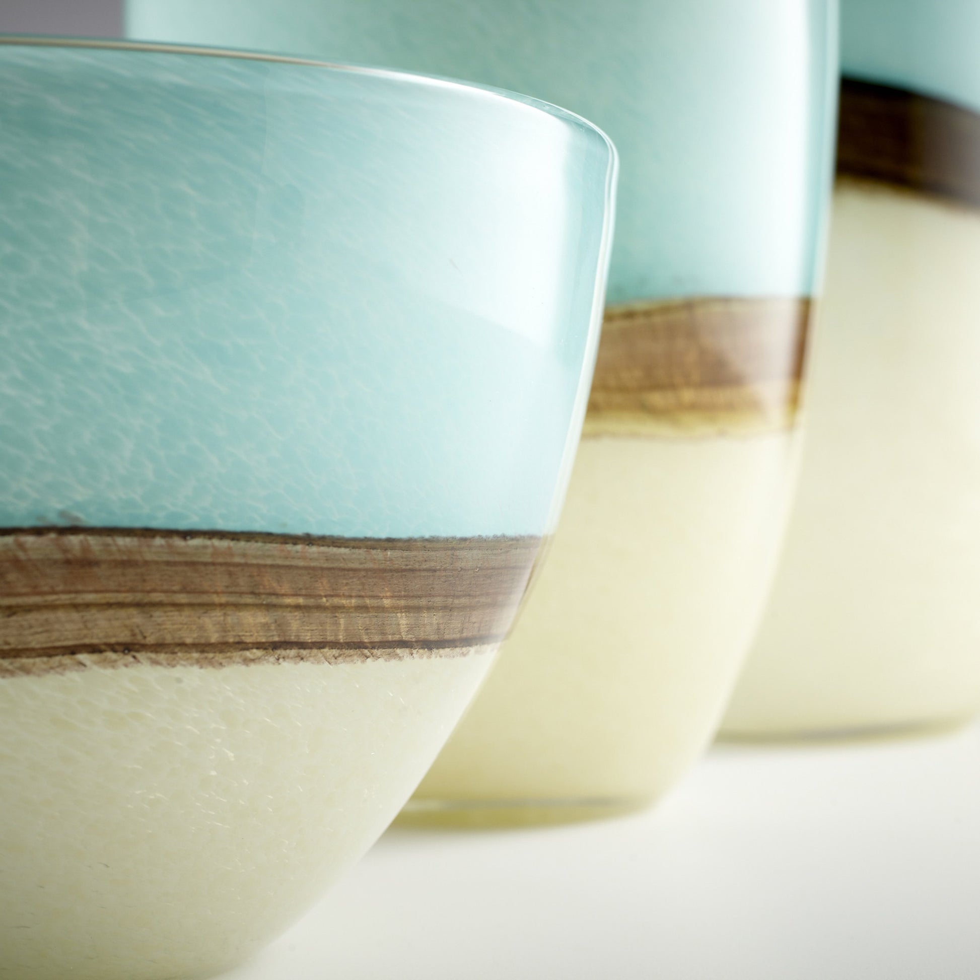 Turquoise Earth Vase by Cyan Design in blue. Made from glass in a modern style.