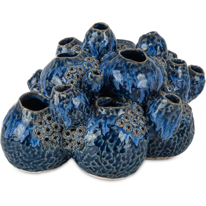 Sulawasi Blue Shells by Currey and Company in reactive dark blue. Made from ceramic in a eclectic & global style.