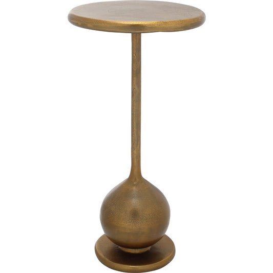 Carillon Accent Table by Currey and Company in antique brass. Made from cast aluminum in a rustic style.
