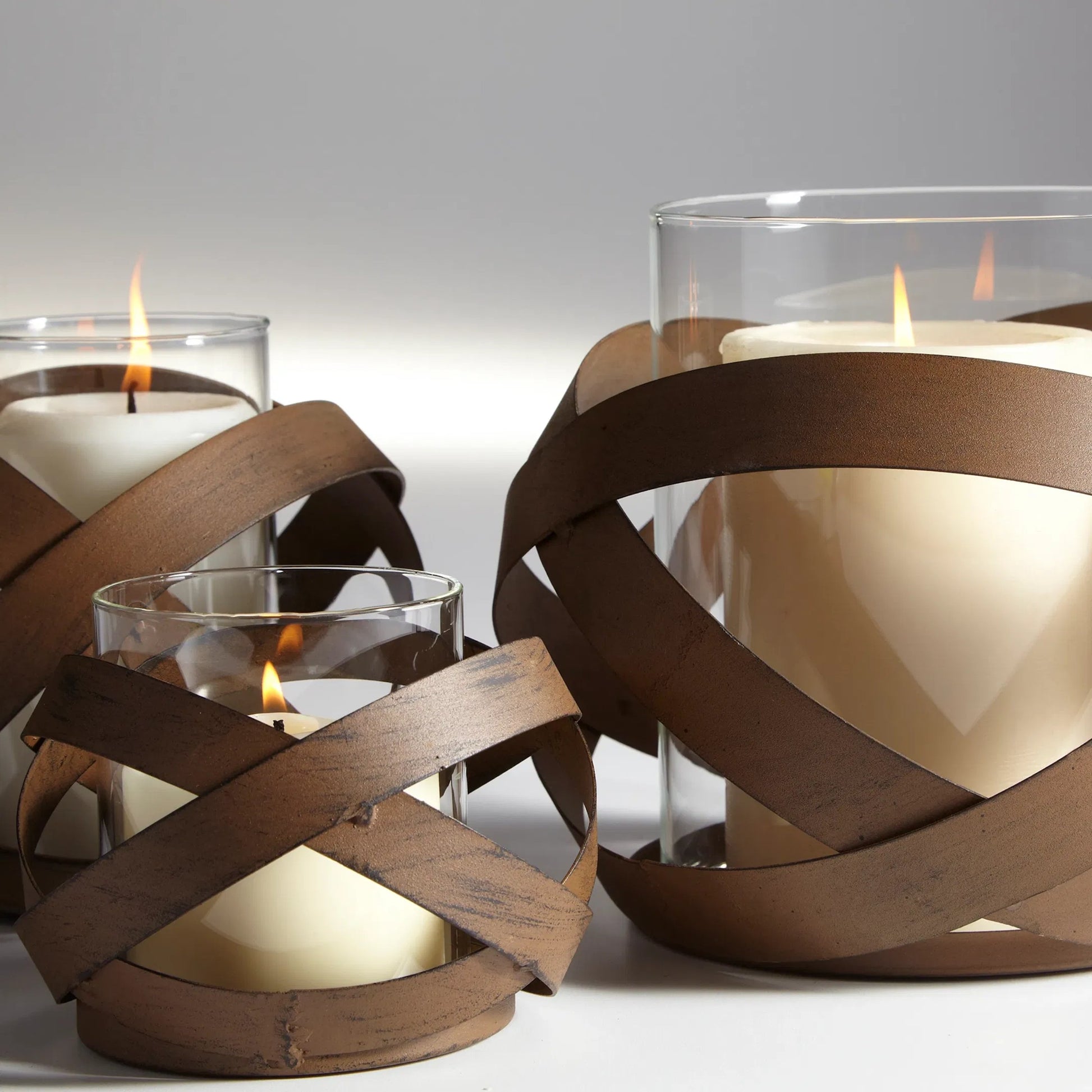 Infinity Candleholder by Cyan Design in copper. Made from iron in a cottage & farmhouse style.