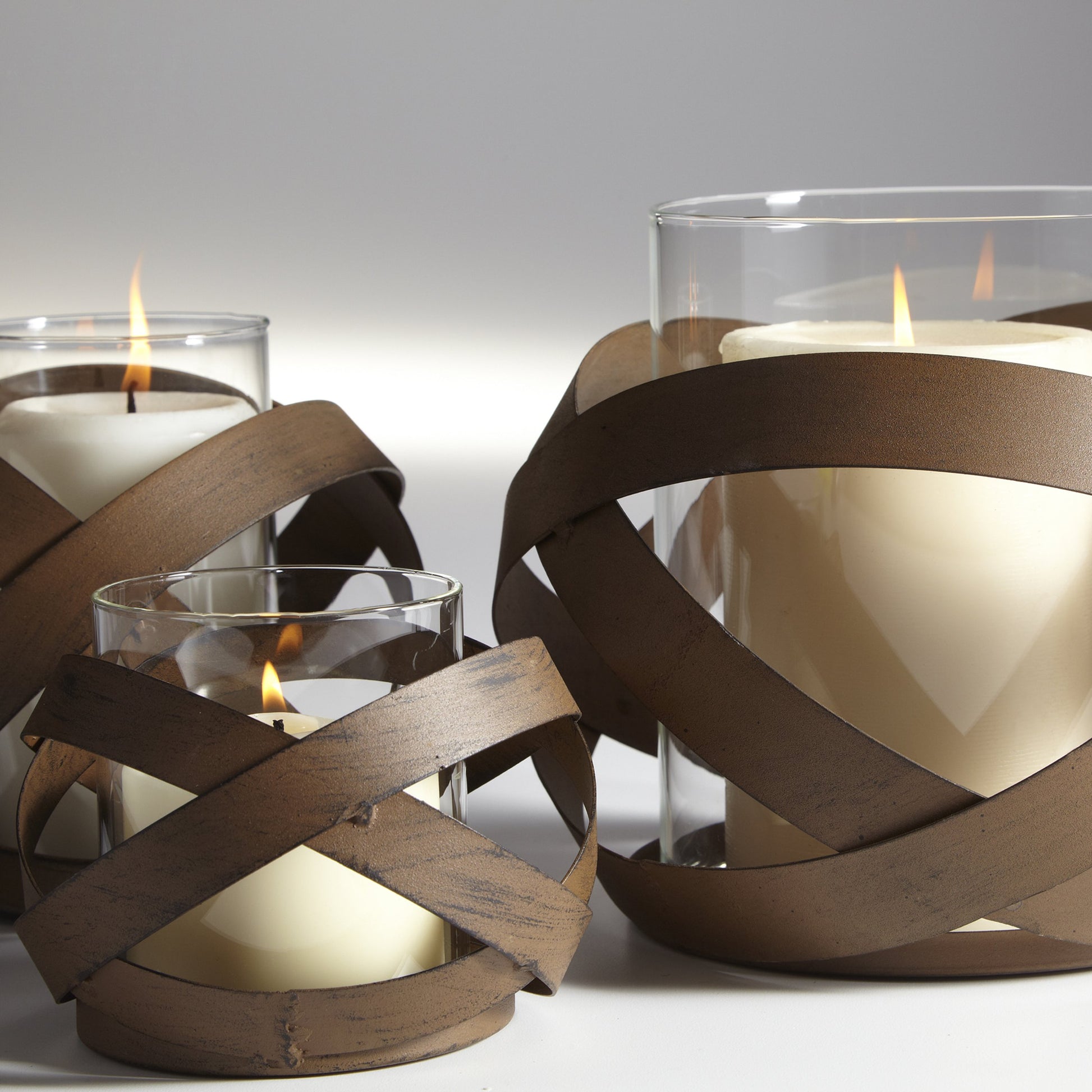 Infinity Candleholder by Cyan Design in copper. Made from iron in a cottage & farmhouse style.