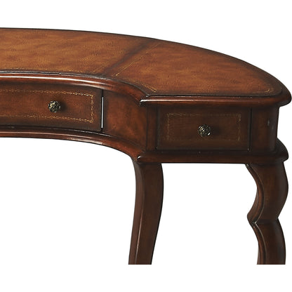 Faux Leather Desk by Butler Specialty Company in medium brown and heritage. Made from wood solids, wood veneers, resin, leather in a traditional style.