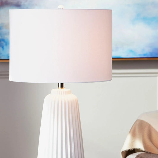 Delphine Table Lamp by Cyan Design in white. Made from ceramic, crystal base, white linen shade, white lining in a modern style.