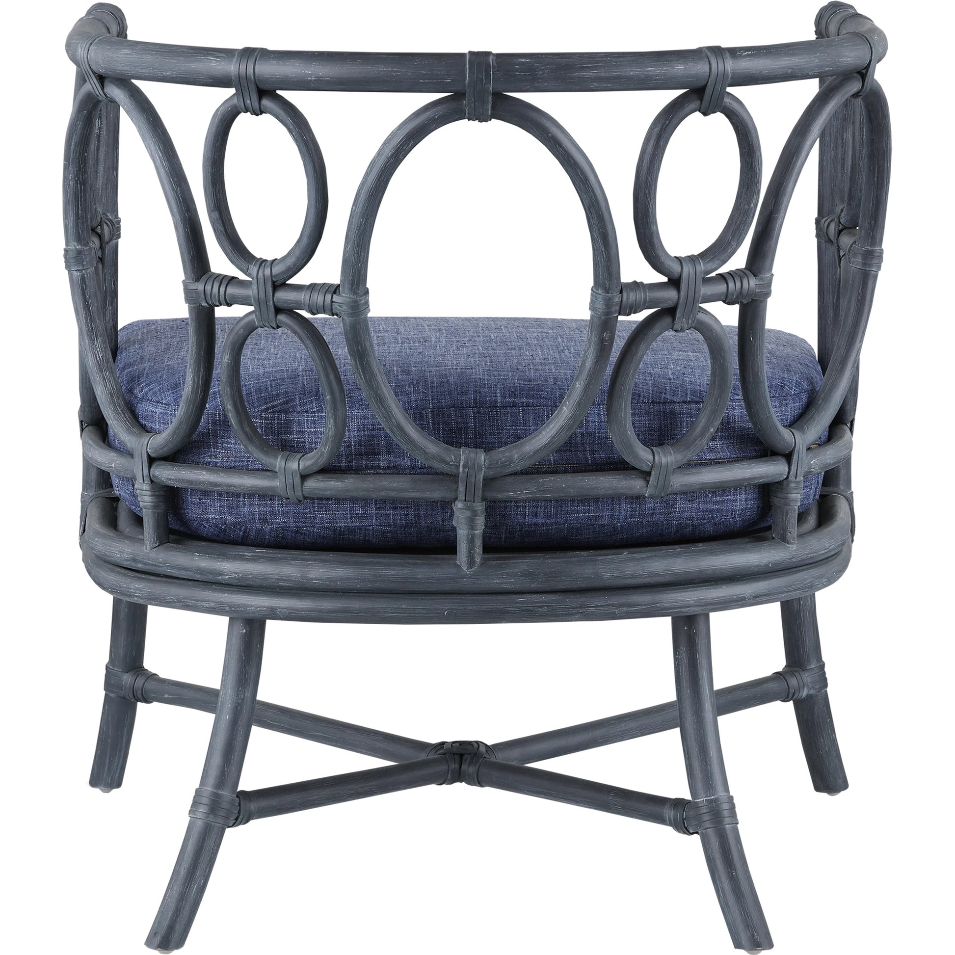 Tegal Chair by Currey and Company in vintage navy, indigo. Made from rattan, plywood, fabric, foam in a coastal style.