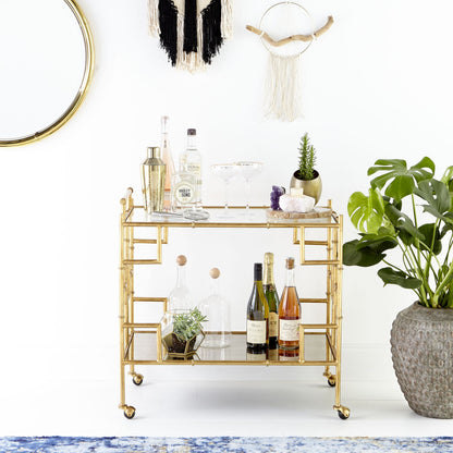 Circular Mirror by Cyan Design in brass. Made from iron, wood, mirrored glass in a transitional style.