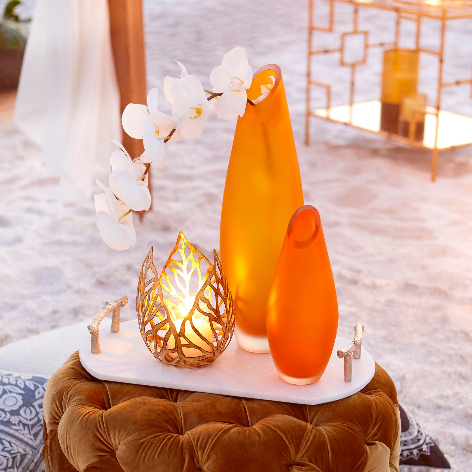 Sunrise Flame Candleholder by Cyan Design in antique gold. Made from iron, glass in a modern style.