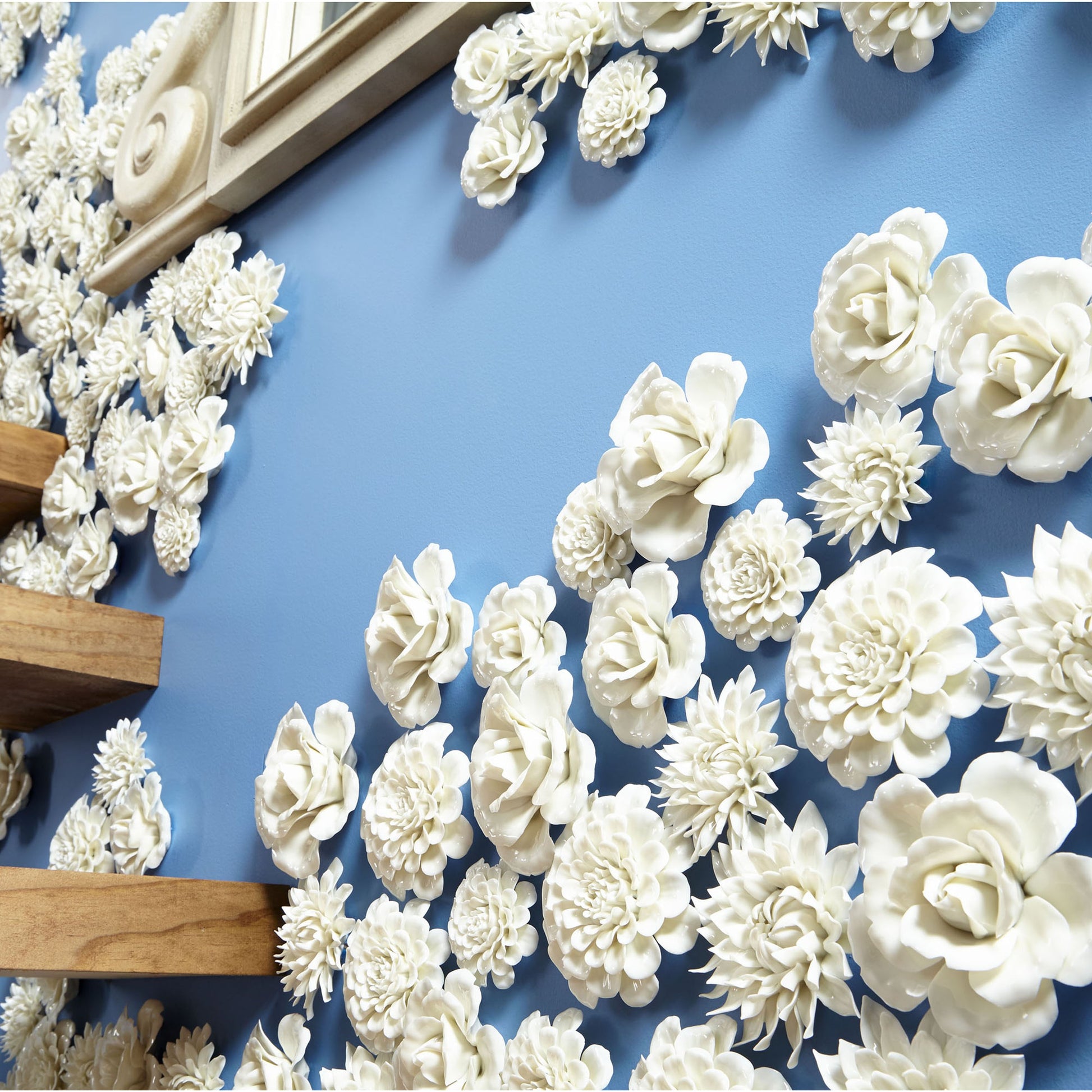 Flourishing Flowers Wall Decor by Cyan Design in off white glaze. Made from ceramic in a modern style.