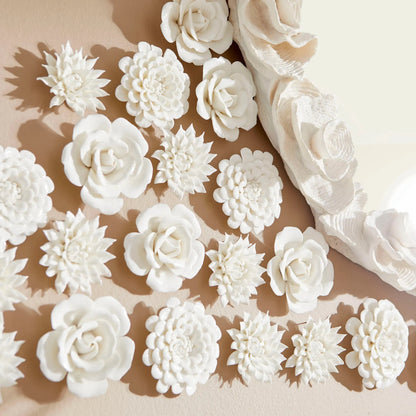 Flourishing Flowers Wall Decor by Cyan Design in off white glaze. Made from ceramic in a modern style.