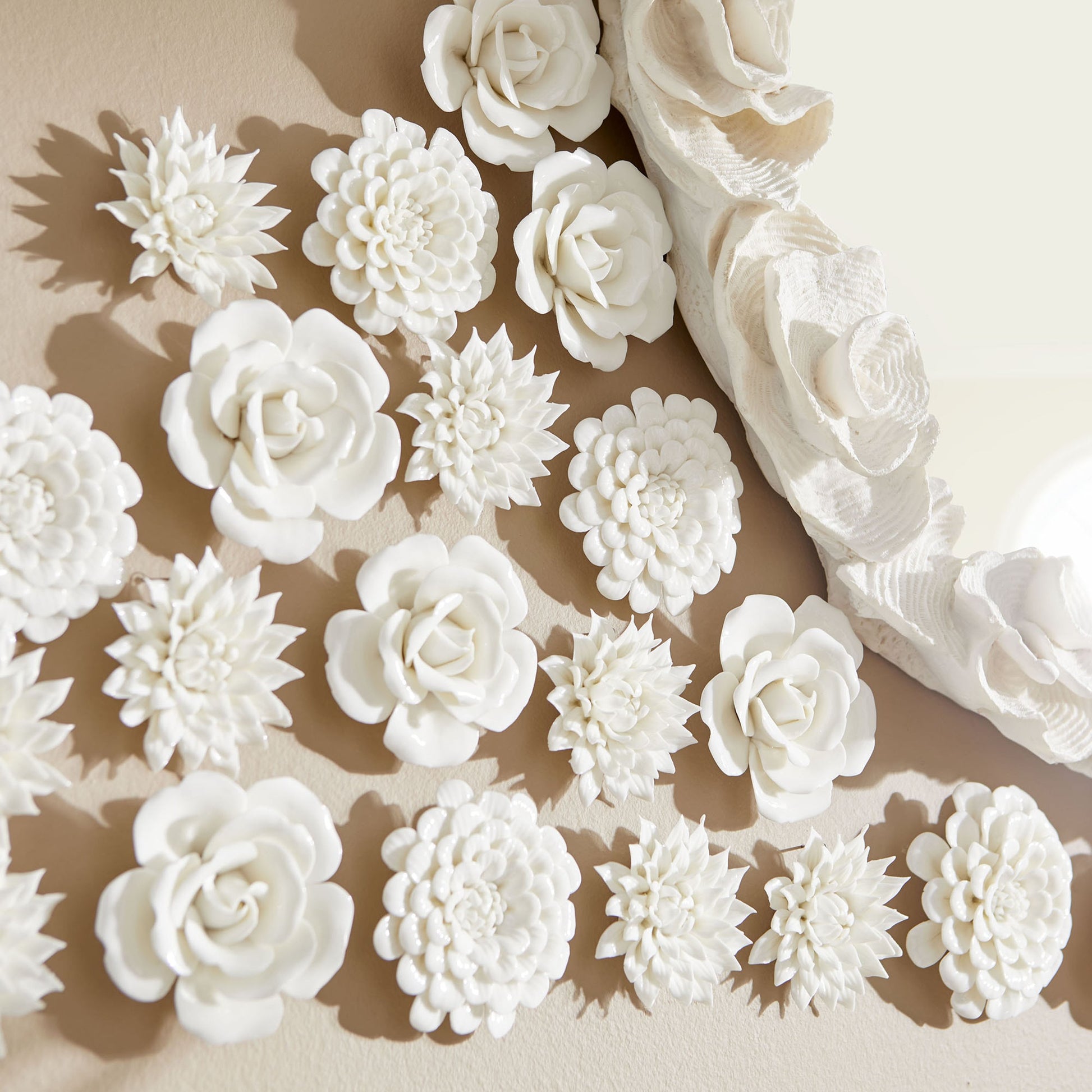 Flourishing Flowers Wall Decor by Cyan Design in off white glaze. Made from ceramic in a modern style.