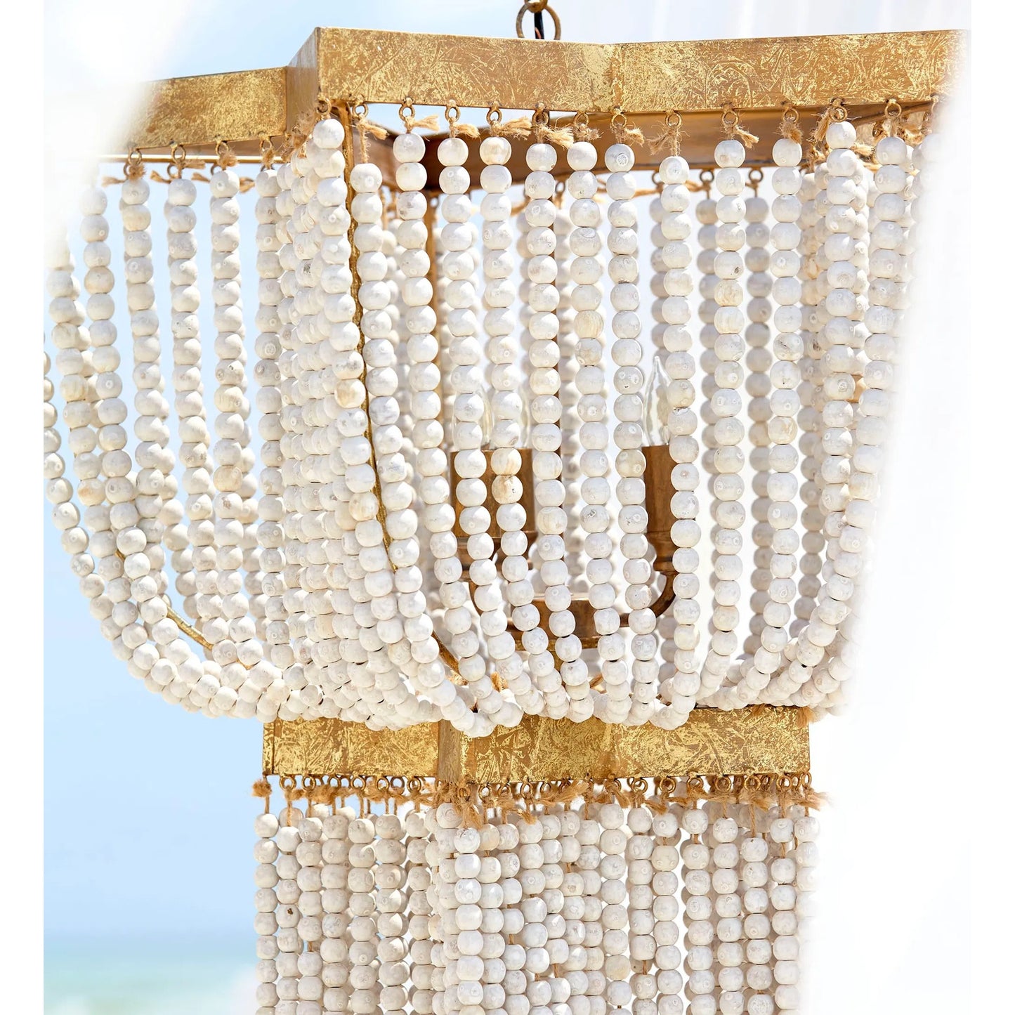 003 S-255512 | Closeup | Estrella Pendant by Cyan Design in tinted gold leaf. Made from iron, wood in a cottage & farmhouse style.