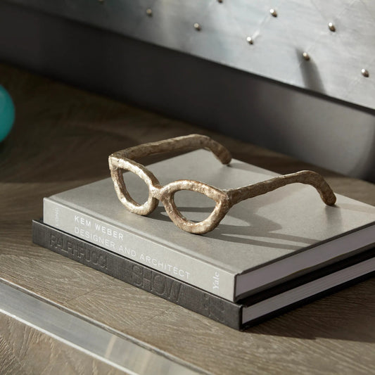 Cat Eyes Sculpture by Cyan Design. Made from iron in a modern style.