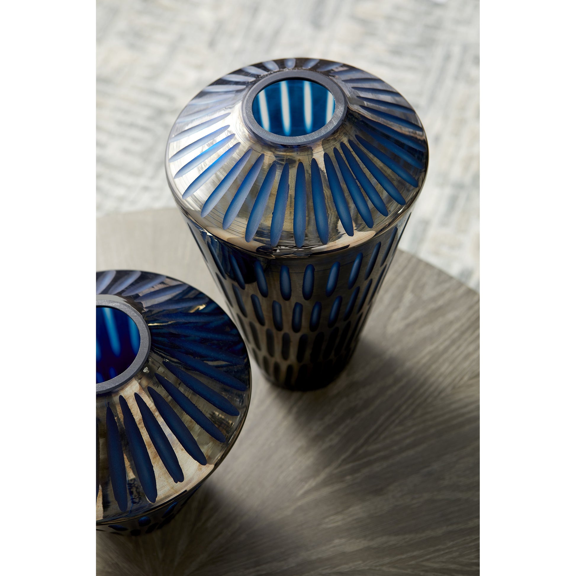 Toreen Vase by Cyan Design in blue. Made from glass in a modern style.