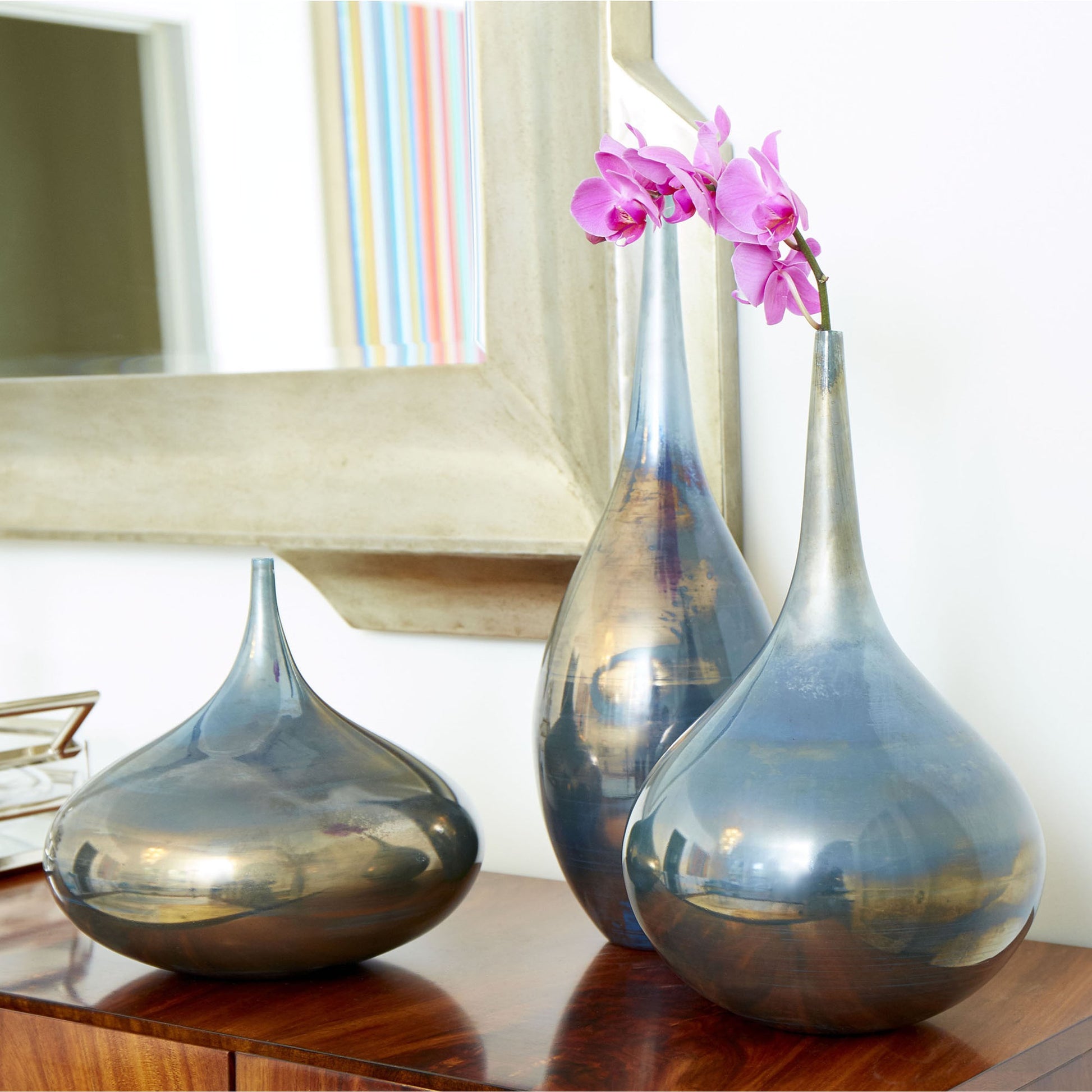 Ariel Vase by Cyan Design in iridescent sunset. Made from glass in a modern style.