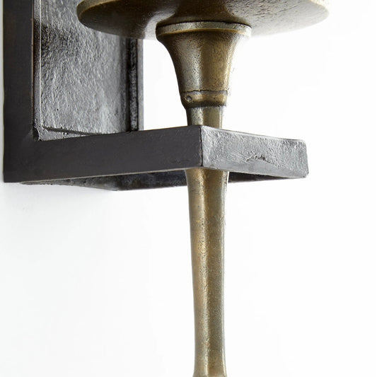 Santiago Candleholder by Cyan Design in antique brass. Made from aluminum in a traditional style.