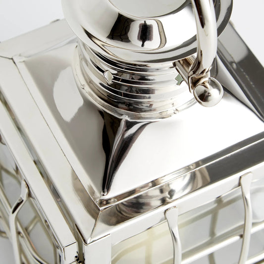 Remington Candleholder by Cyan Design in nickel. Made from stainless steel, glass in a traditional style.