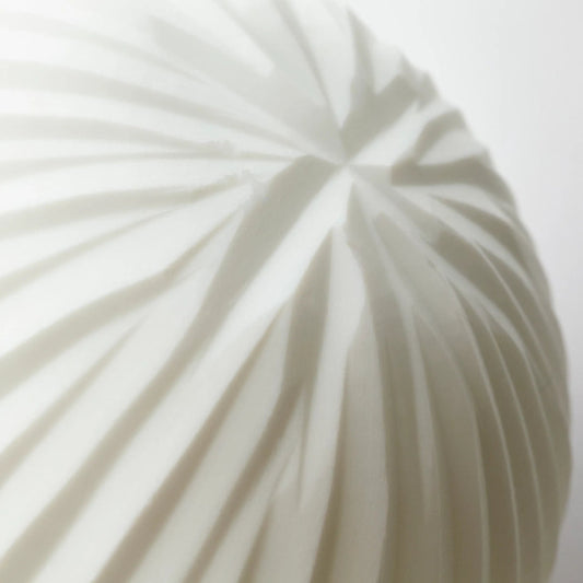 Veles Filler by Cyan Design in white. Made from glass in a coastal style.