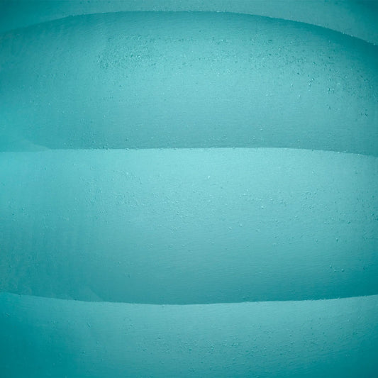 Wani Filler by Cyan Design in turquoise blue. Made from glass in a coastal style.