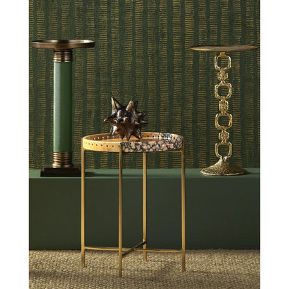 Jussi Drinks Table by Currey and Company in gold. Made from cast aluminum in a modern style.