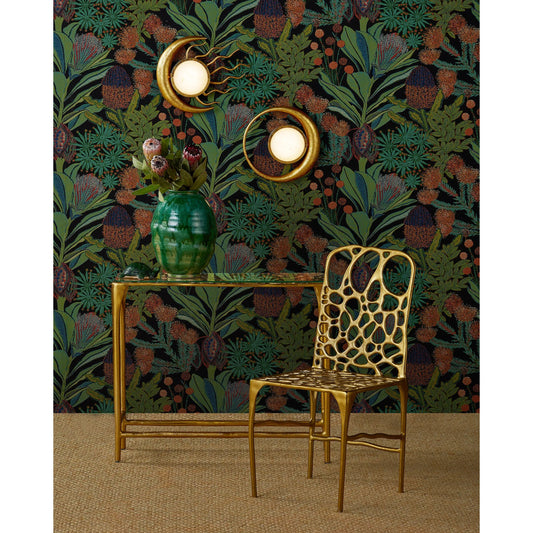 Honeycomb Side Chair by Currey and Company in gold. Made from cast aluminum in a unique style.
