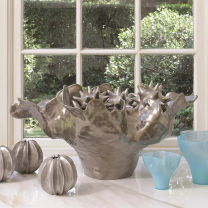 Meteor Bowl by Global Views. Made from ceramic in a coastal style.