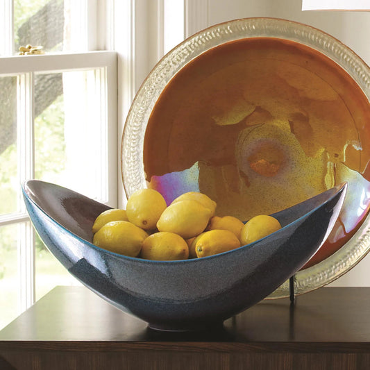 Swoop Bowl by Global Views. Made from ceramic in a modern style.