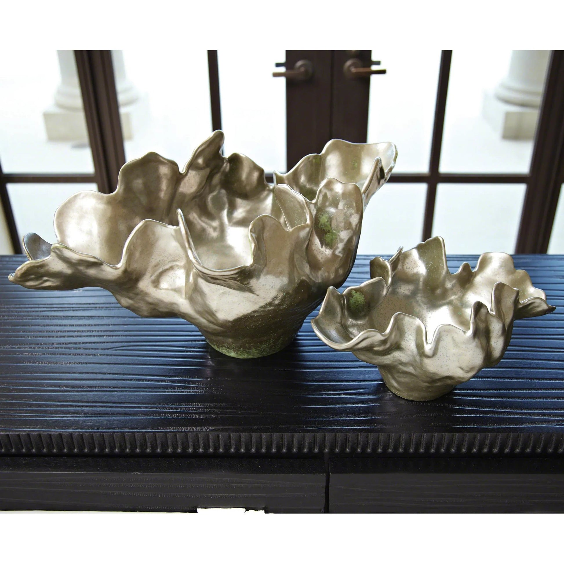 Meteor Bowl by Global Views. Made from ceramic in a coastal style.