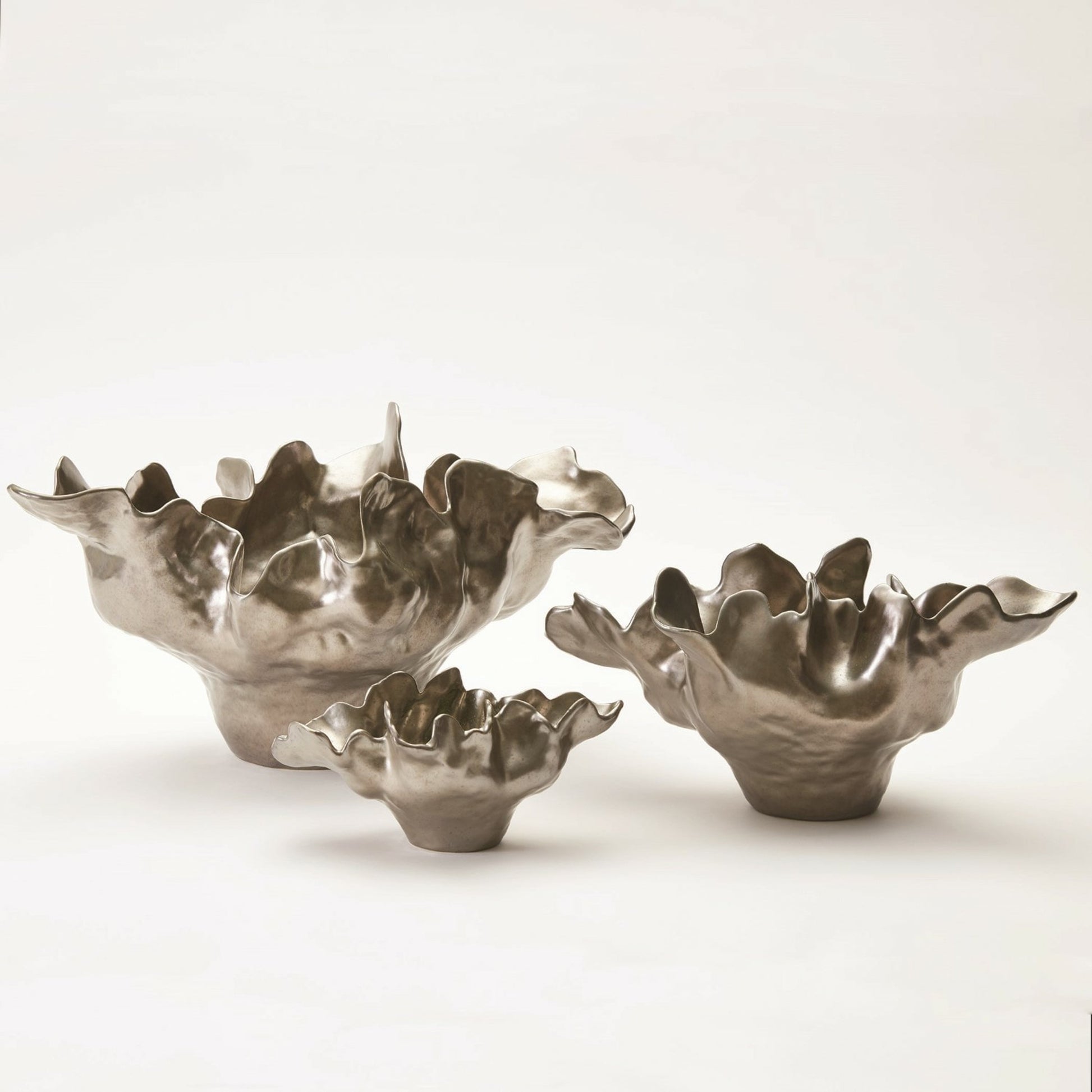 Meteor Bowl by Global Views. Made from ceramic in a coastal style.