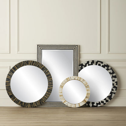 Niva Round Wall Mirror by Currey and Company in cream, brass, mirror. Made from composite, brass, glass, engineered hardwood in a modern style.