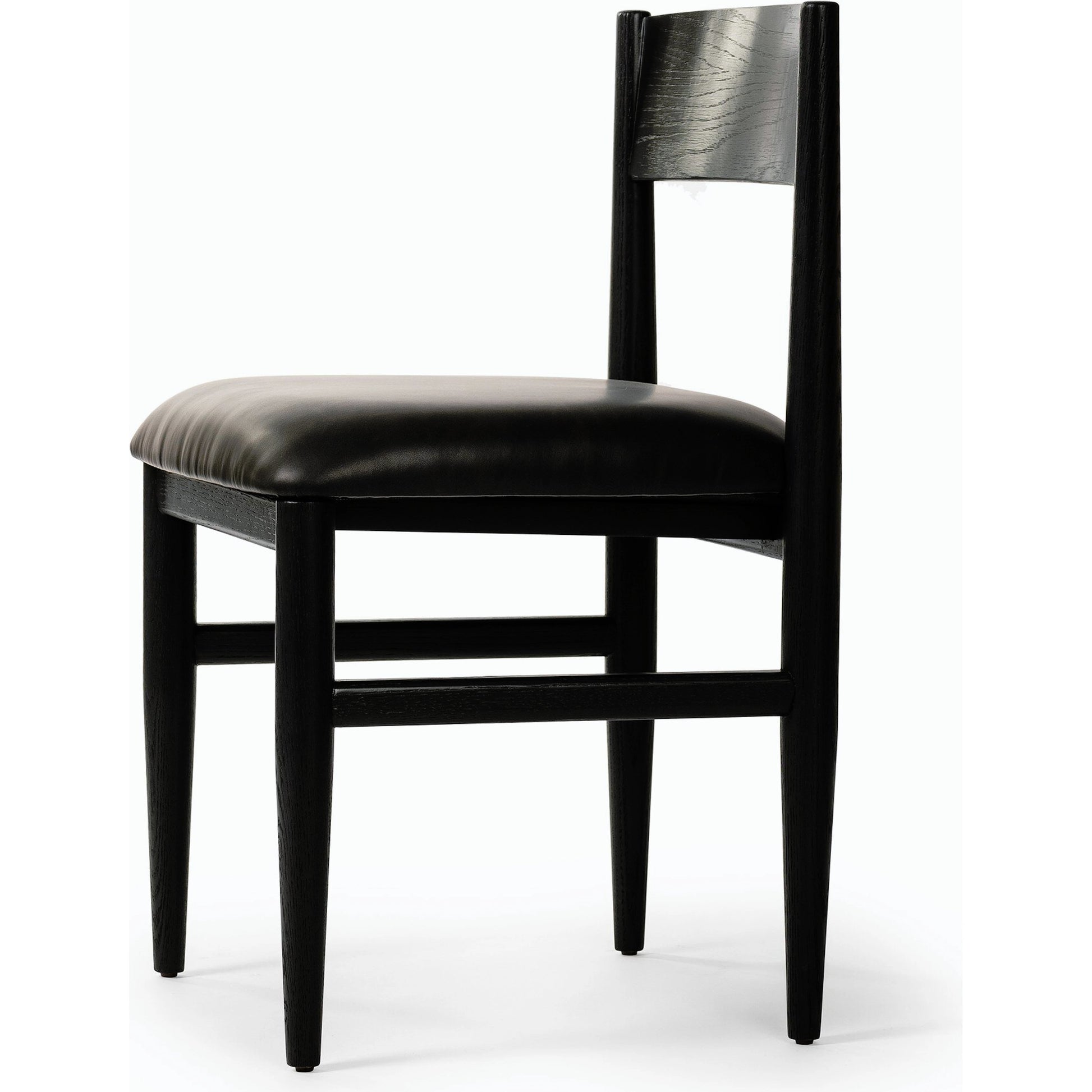 Mavery Armless Dining Chair by Four Hands in sierra espresso, brushed ebony oak, brushed ebony oak veneer. Made from faux leather, solid oak, oak veneer in a modern style.