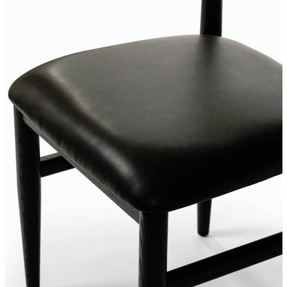 Mavery Armless Dining Chair by Four Hands in sierra espresso, brushed ebony oak, brushed ebony oak veneer. Made from faux leather, solid oak, oak veneer in a modern style.