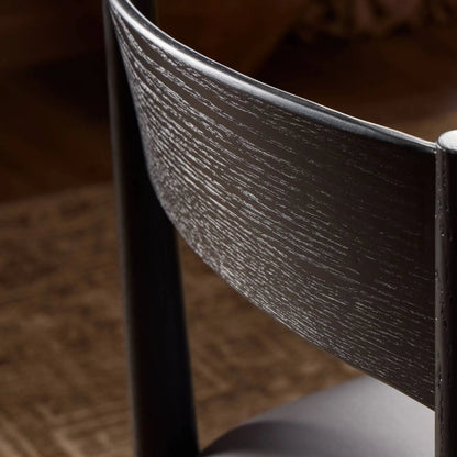Mavery Armless Dining Chair by Four Hands in sierra espresso, brushed ebony oak, brushed ebony oak veneer. Made from faux leather, solid oak, oak veneer in a modern style.