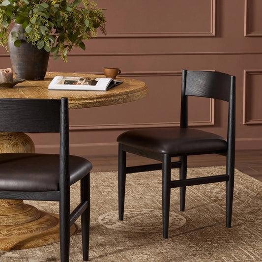 Mavery Armless Dining Chair by Four Hands in sierra espresso, brushed ebony oak, brushed ebony oak veneer. Made from faux leather, solid oak, oak veneer in a modern style.