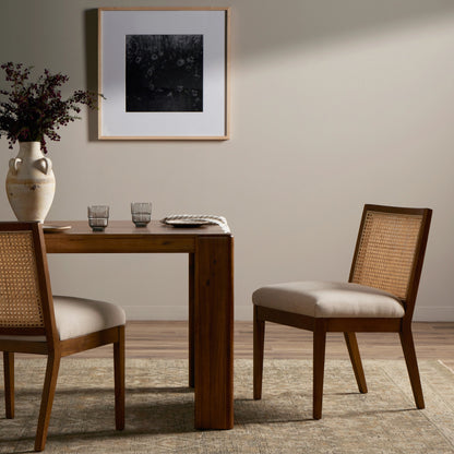 Antonia Cane Armless Dining Chair by Four Hands in toasted nettlewood. Made from unique in a transitional style.