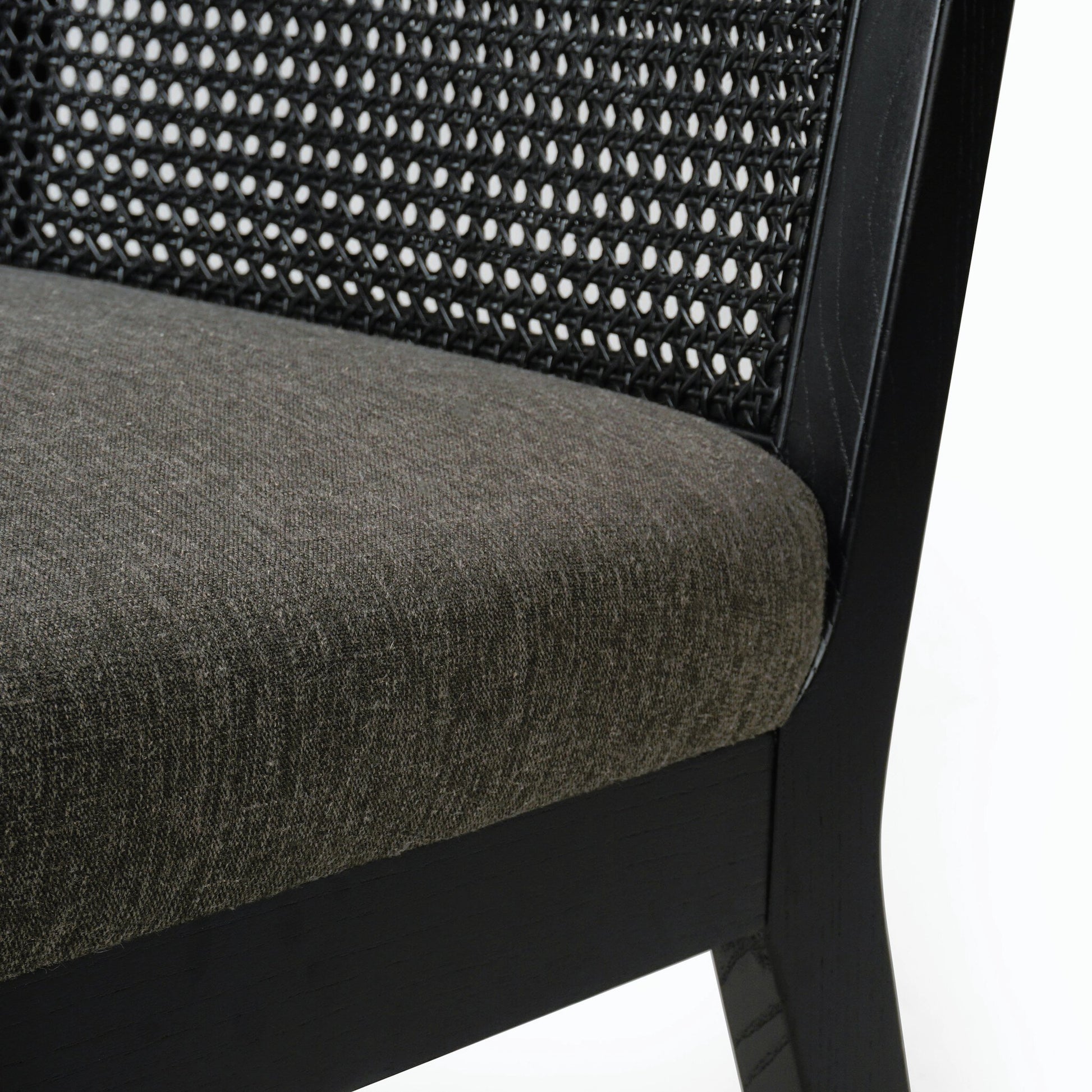Antonia Cane Dining Chair by Four Hands in brushed ebony, sonoma black. Made from top grain leather, solid nettlewood, cane in a modern style.