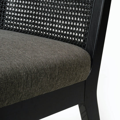Antonia Cane Dining Chair by Four Hands in brushed ebony, sonoma black. Made from top grain leather, solid nettlewood, cane in a modern style.