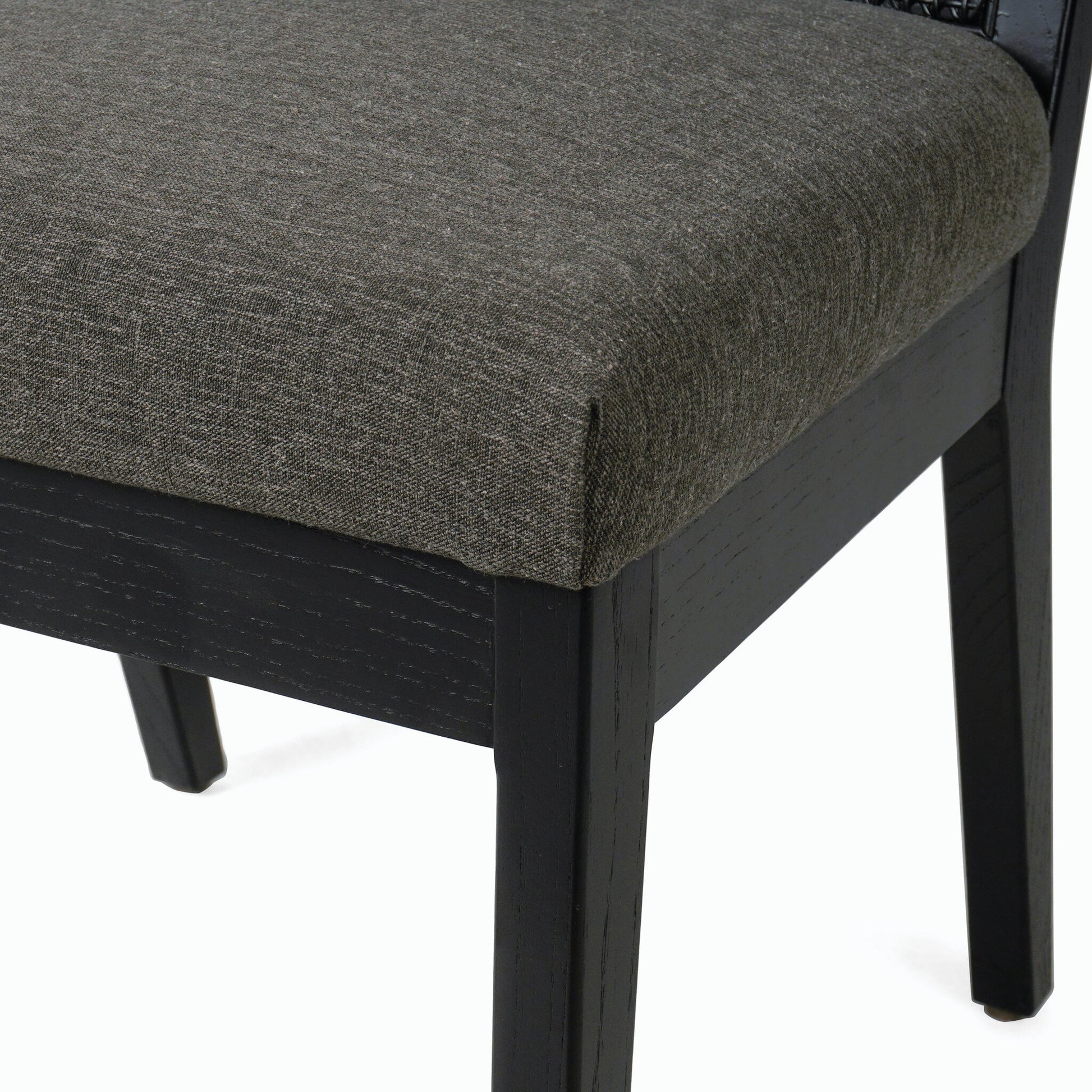 Antonia Cane Dining Chair by Four Hands in brushed ebony, sonoma black. Made from top grain leather, solid nettlewood, cane in a modern style.