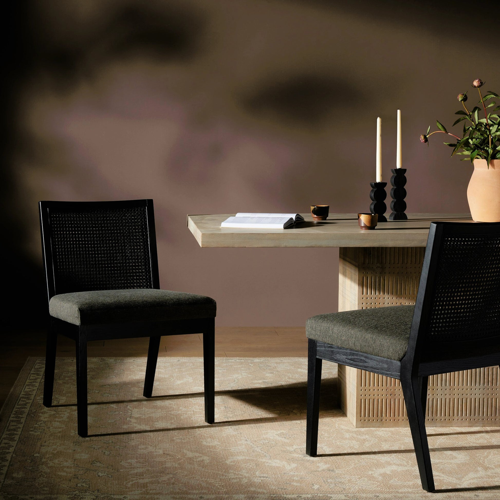 Antonia Cane Dining Chair by Four Hands in brushed ebony, sonoma black. Made from top grain leather, solid nettlewood, cane in a modern style.