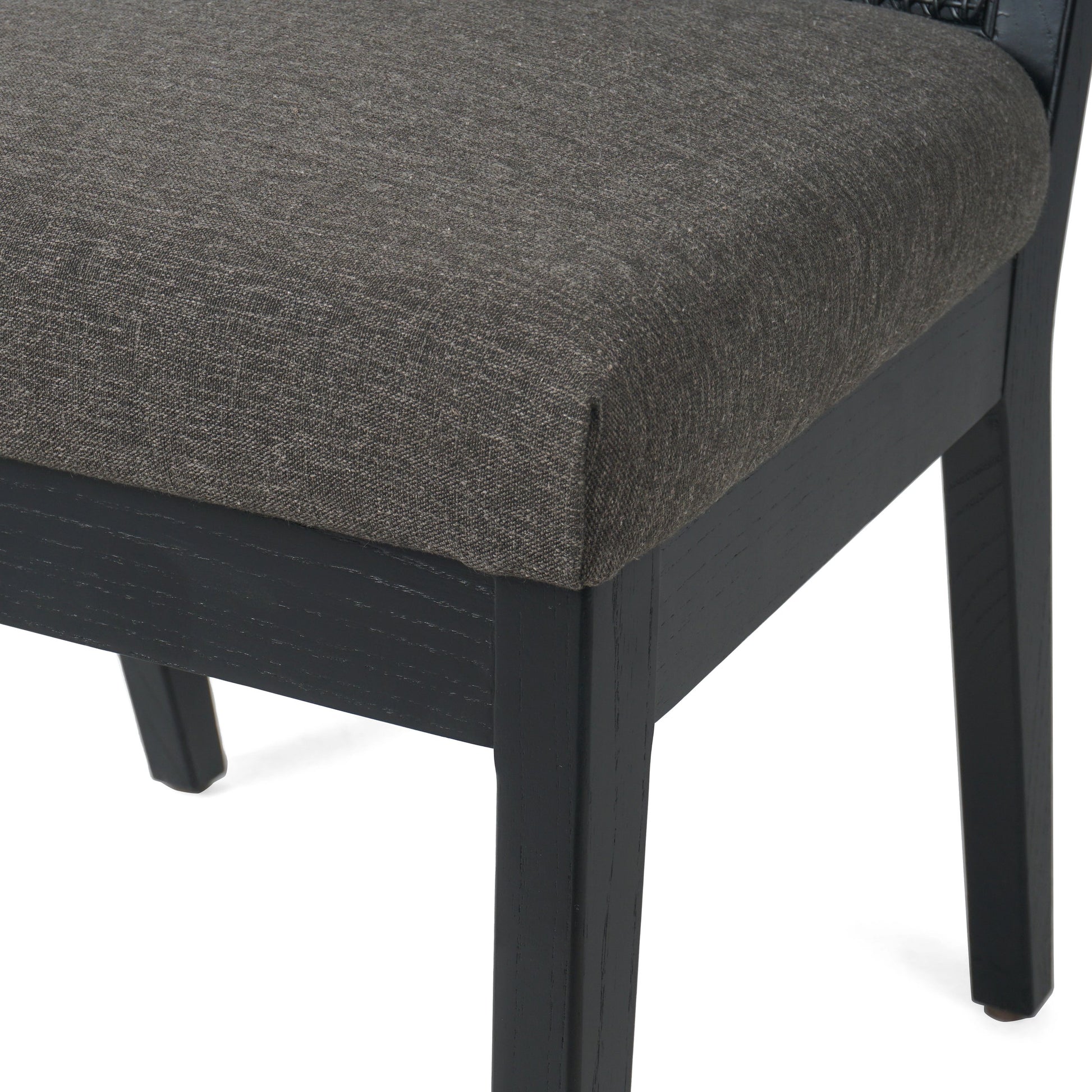 Antonia Cane Dining Chair by Four Hands in brushed ebony, sonoma black. Made from top grain leather, solid nettlewood, cane in a modern style.