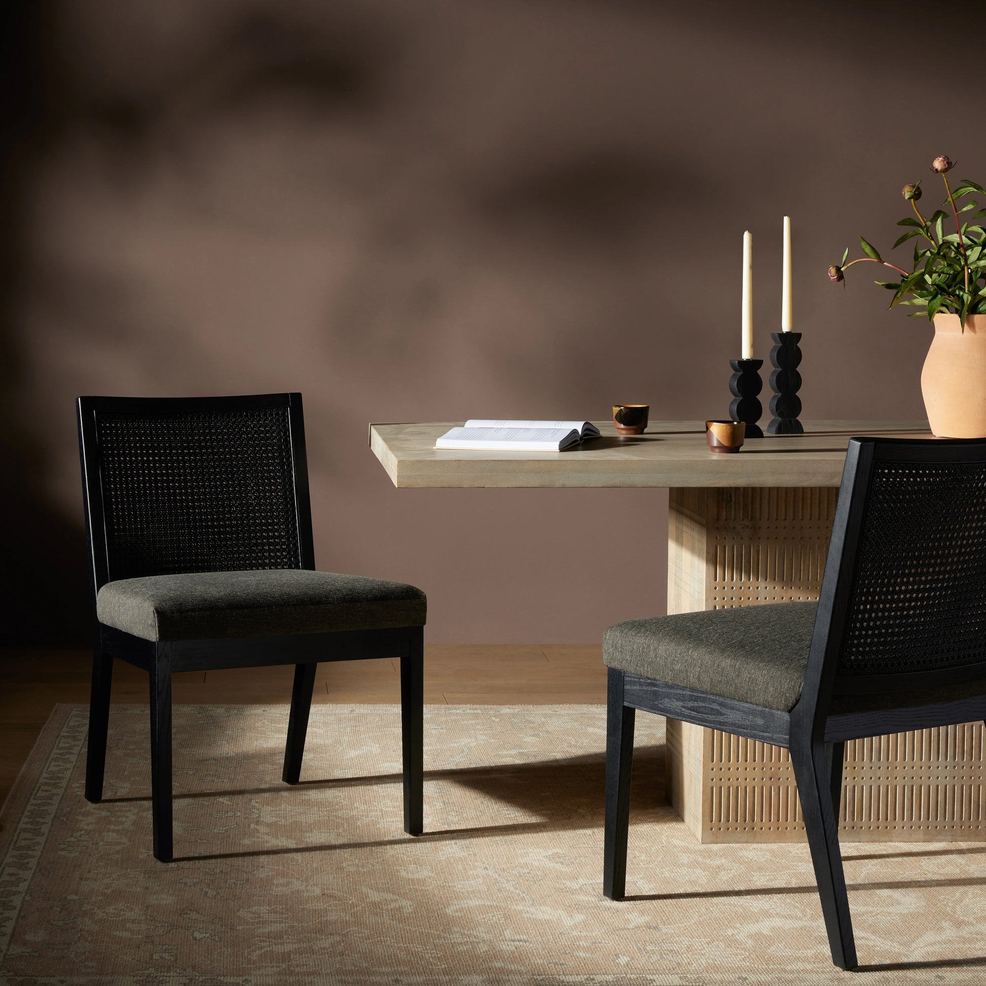 Antonia Cane Dining Chair by Four Hands in brushed ebony, sonoma black. Made from top grain leather, solid nettlewood, cane in a modern style.