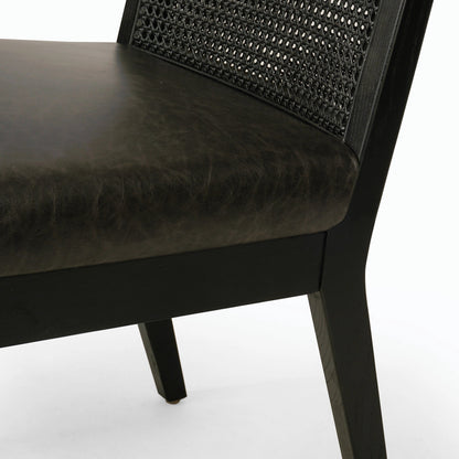 Antonia Cane Dining Chair by Four Hands in brushed ebony, sonoma black. Made from top grain leather, solid nettlewood, cane in a modern style.