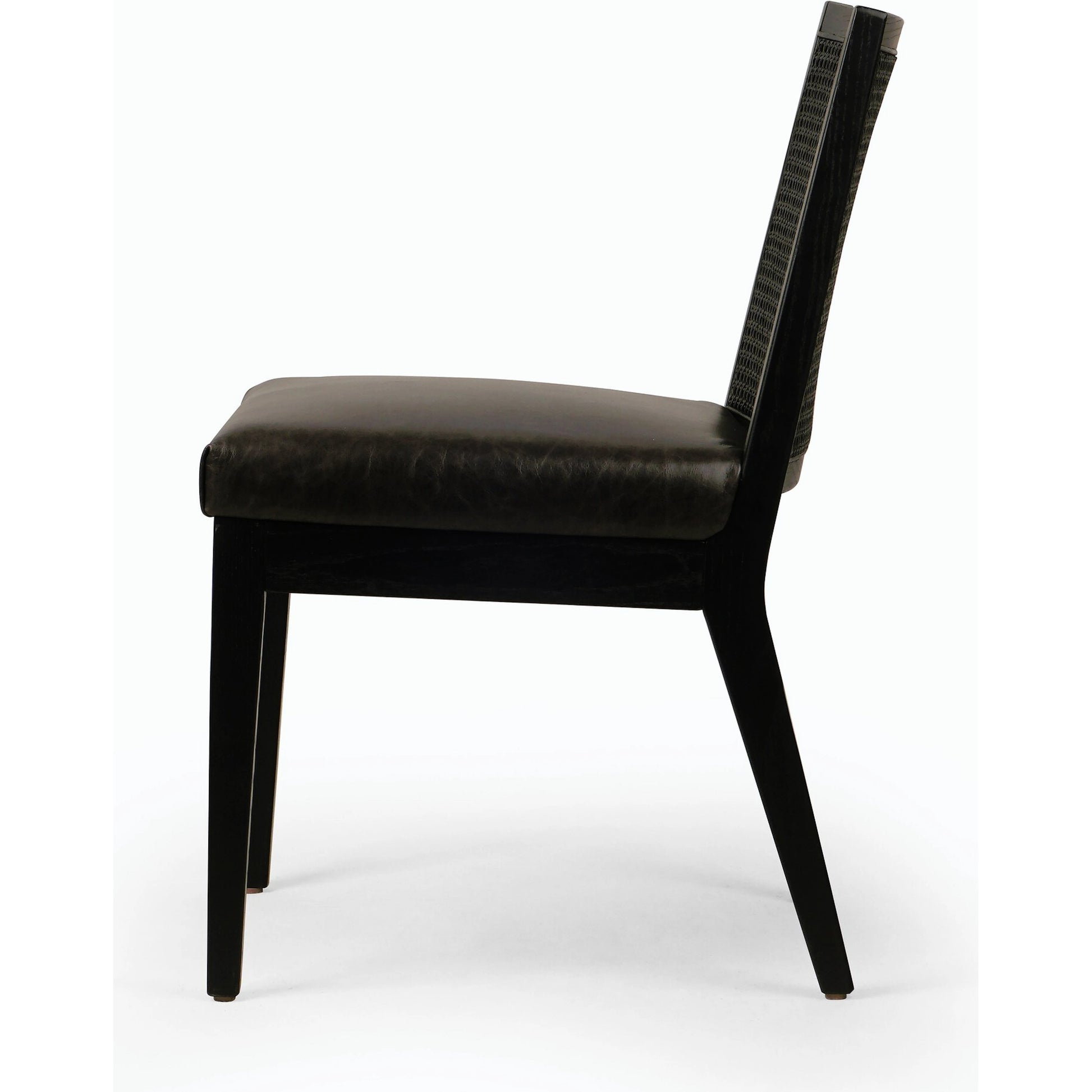 Antonia Cane Dining Chair by Four Hands in brushed ebony, sonoma black. Made from top grain leather, solid nettlewood, cane in a modern style.