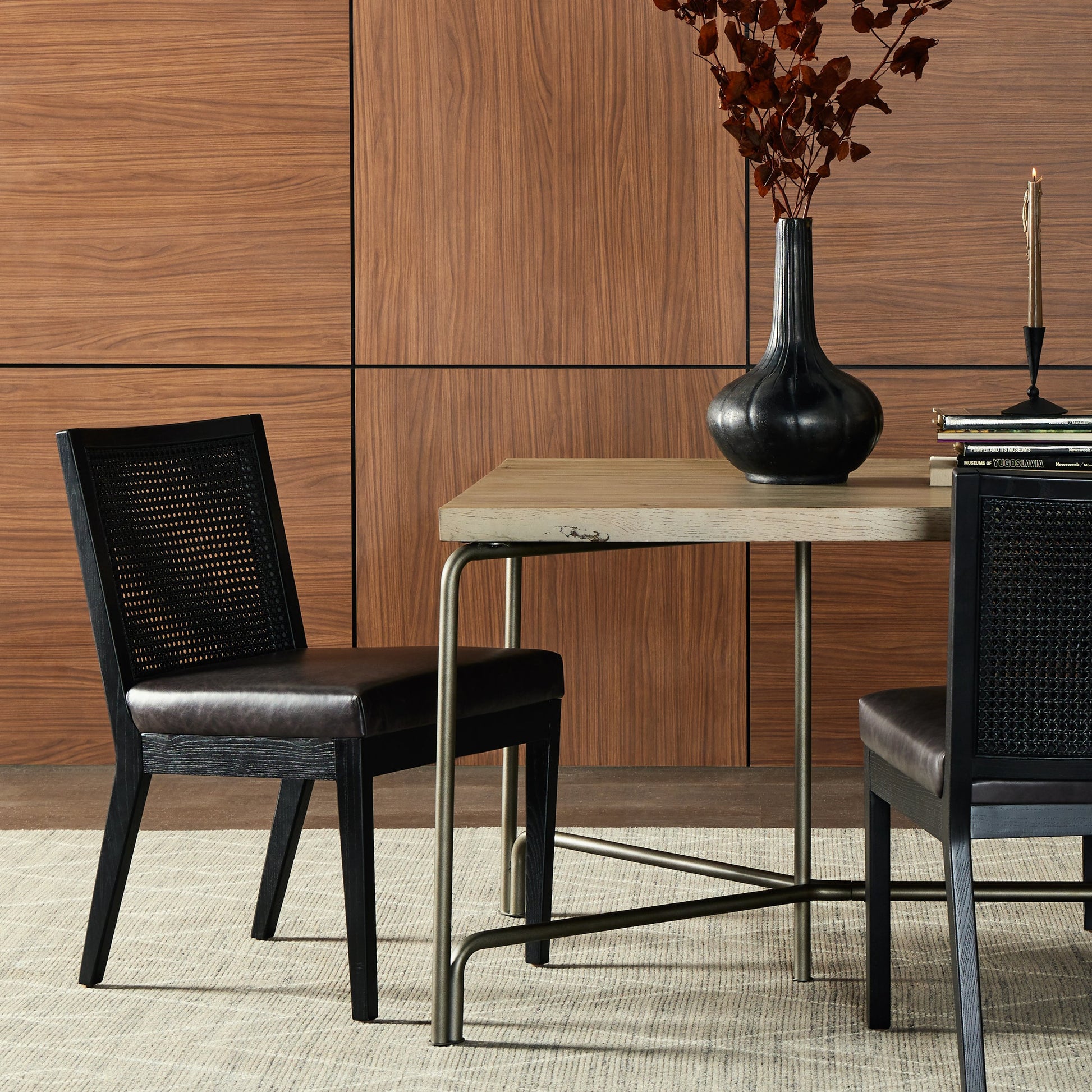 Antonia Cane Dining Chair by Four Hands in brushed ebony, sonoma black. Made from top grain leather, solid nettlewood, cane in a modern style.
