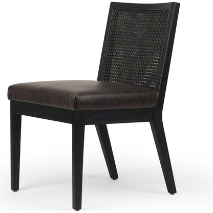 Antonia Cane Dining Chair by Four Hands in brushed ebony, sonoma black. Made from top grain leather, solid nettlewood, cane in a modern style.