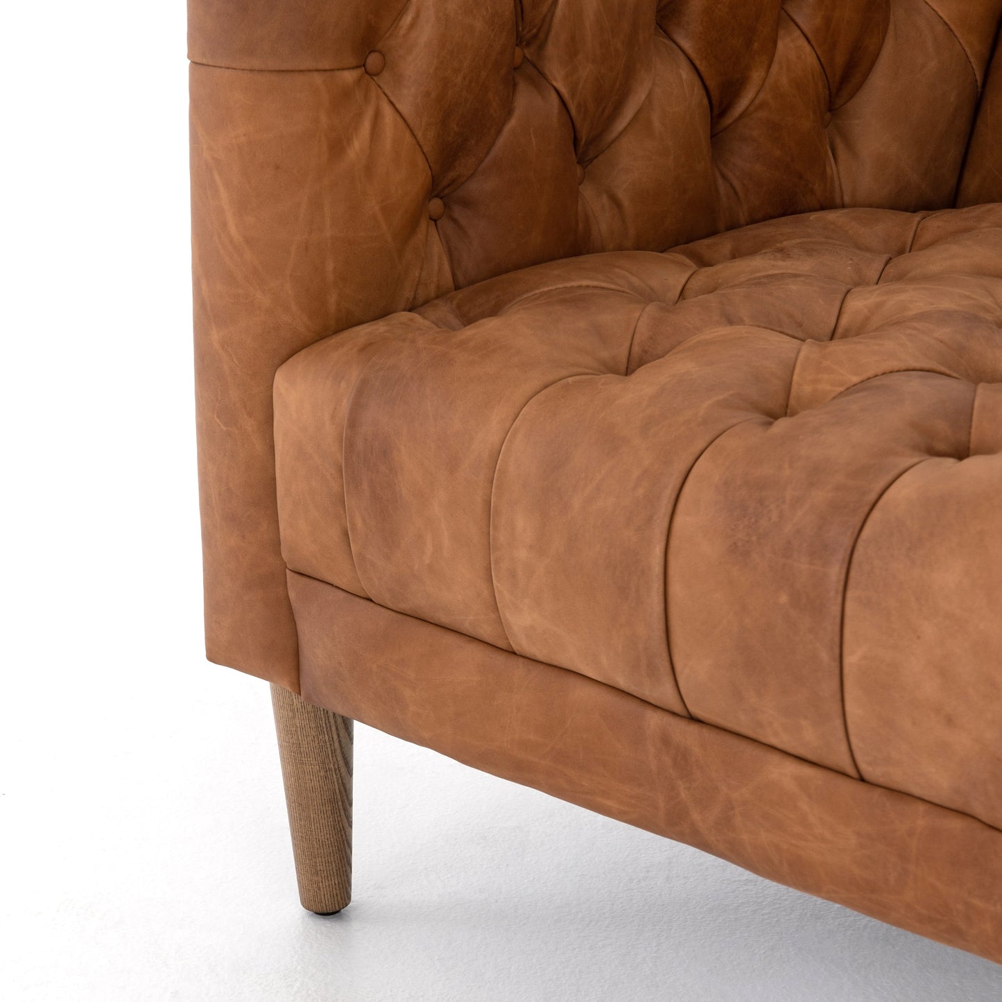 011 SI-1980790 | Closeup | Williams Leather Chair by Four Hands in natural washed camel, weathered ash. Made from top grain leather, solid ash, 100% polyester in a rustic style.