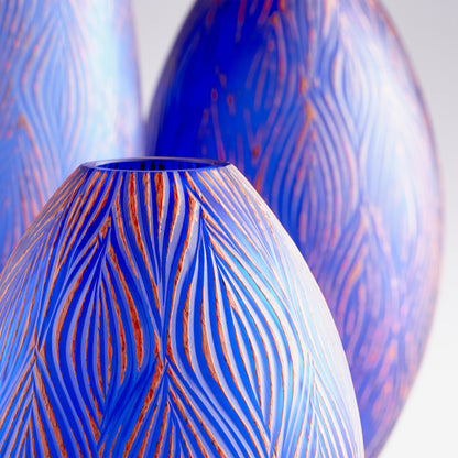 Fused Groove Vase by Cyan Design in blue. Made from glass in a coastal style.