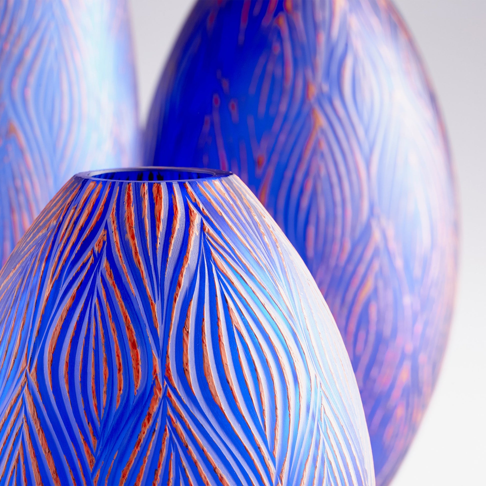 Fused Groove Vase by Cyan Design in blue. Made from glass in a coastal style.